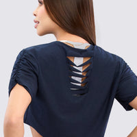 CAMISETA CROP AZUL MARINO CON CORTES TRASEROS RVC