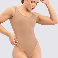 Body seamless color nude, textura acanalada, escote redondo, ajuste de segunda piel.
