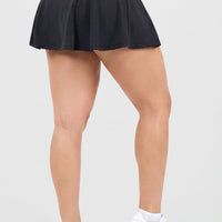 FALDA DEPORTIVA NEGRA CON PLIEGUES RVC