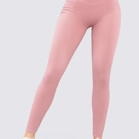 Leggings deportivo color palo de rosa con cintura alto, y textura estilo rib.