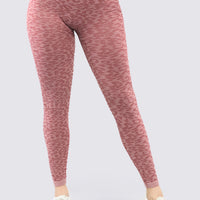 Leggings deportivo color palo de rosa con patrones de animal print.