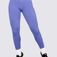 LEGGINGS SEAMLESS COLOR LILA, CON CINTURA ACANALADA PARA MEJOR SOPORTE.
