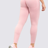 Leggings push up, color rosado pastel, cintura acanalada, para la compresión del abdomen.