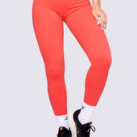 LEGGINGS COLOR CORAL ELABORADO EN TELA RIB.