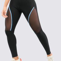 Leggings color negro, con mallas laterales y venas en color azul hortensia. Perfectos para cualquier ocasión.