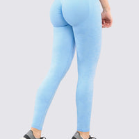 Leggings deportivo seamless con patrón floral, tiro alto y arrunchado en glúteos.