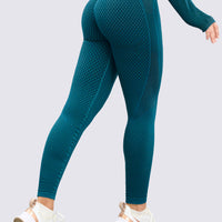 Leggings seamless azul turquesa con textura, patrones de líneas, efecto moldeador que se ajuste a tu figura.