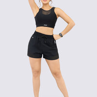 PANTALONETA NEGRA CON MALLAS LATERALES RVC