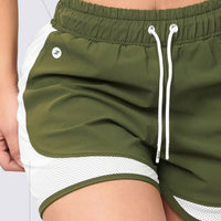 PANTALONETA VERDE CON MALLAS LATERALES RVC