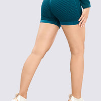 Short seamless texturizado en color verde turquesa, pretina alta, ajuste perfecto y levanta glúteos.