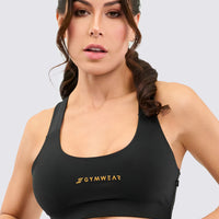 Top deportivo color negro, con alto soporte y perfecto para cualquier actividad deportiva.