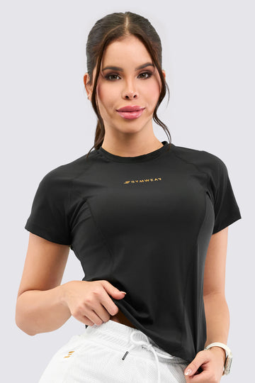 Blusa deportiva en color negro, perfecta para tenis, pádel o running.