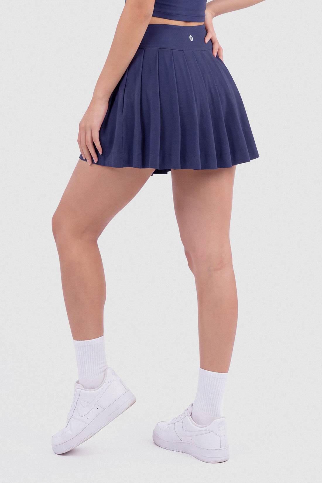 FALDA PLIEGUES AZUL MARINO PPC