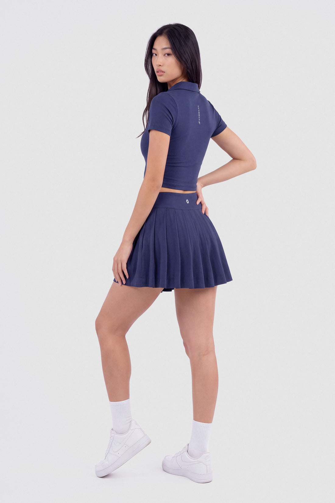 FALDA PLIEGUES AZUL MARINO PPC