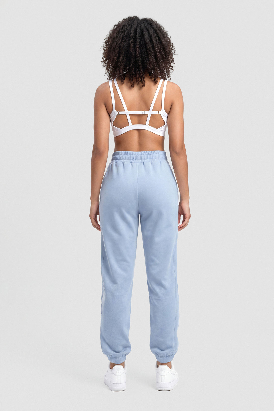 JOGGER BABY BLUE CON FRANJAS LATERALES RVC CDC