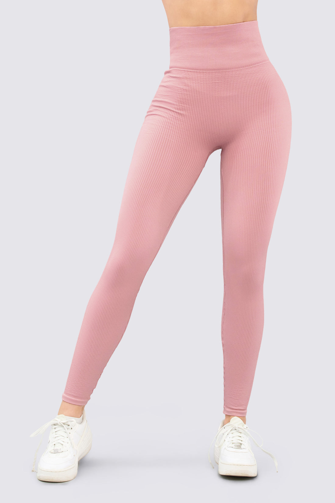 Leggings deportivo color palo de rosa con cintura alto, y textura estilo rib.