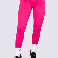 LEGGINGS COLOR FUCSIA SEAMLESS, CINTURA ACANALADA DE APOYO Y SILUETA AJUSTADA CON REALCE DE COLA. 