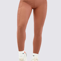 Leggings color nude, con tela burda texturizada, perfectos para gym.