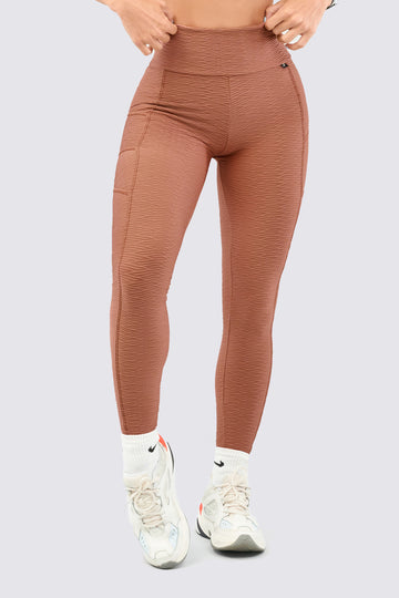 Leggings color nude, con tela burda texturizada, perfectos para gym.