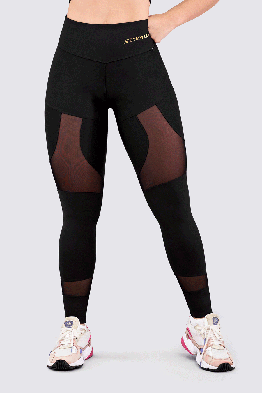 LEGGINGS COLOR NEGRO CON DISEÑO DE MALLAS EN LA PARTE FRONTAL.