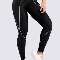 LEGGINGS DEPORTIVO PARA MUJER EN COLOR NEGRO, CON VENAS EN COLOR VERDE, Y BOLSILLOS LATERALES.