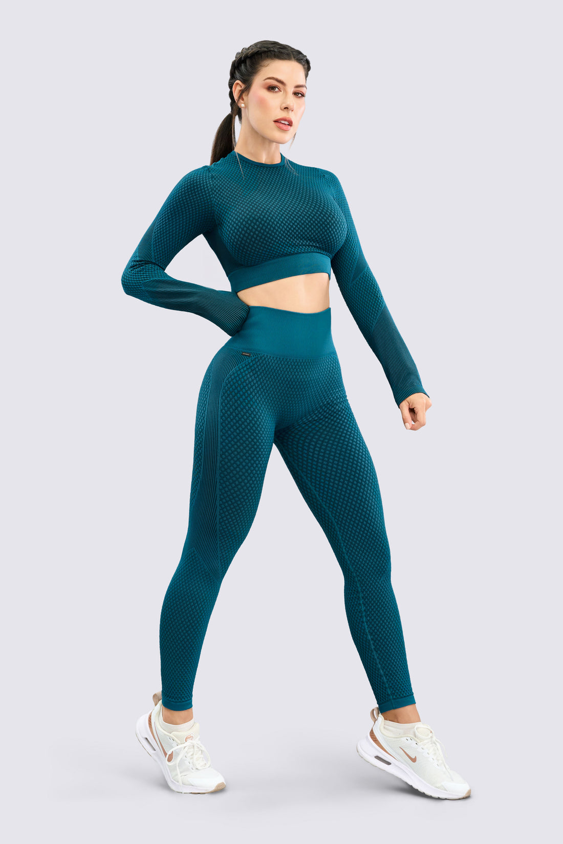 BUZO VERDE TURQUESA AJUSTADO Y TEXTURIZADO RVC