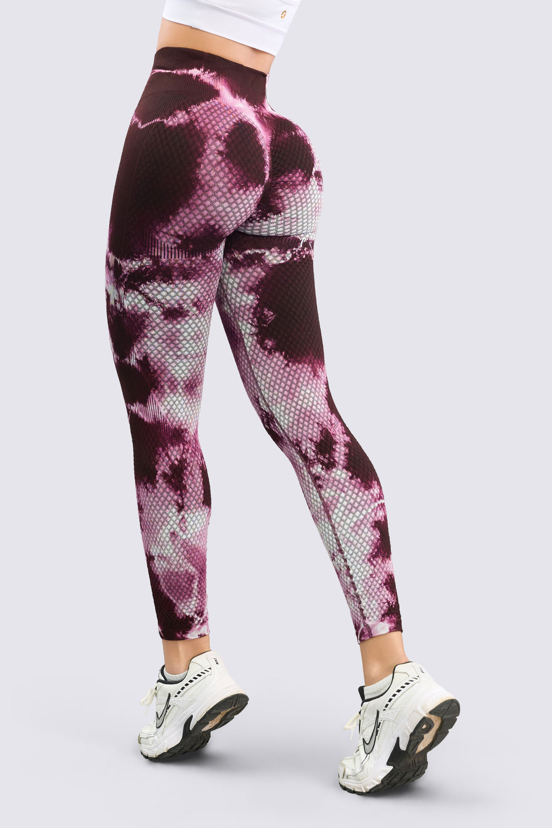 Leggings tye dye en color cerezo oscuro, de pretina alta y textura de waffle. 