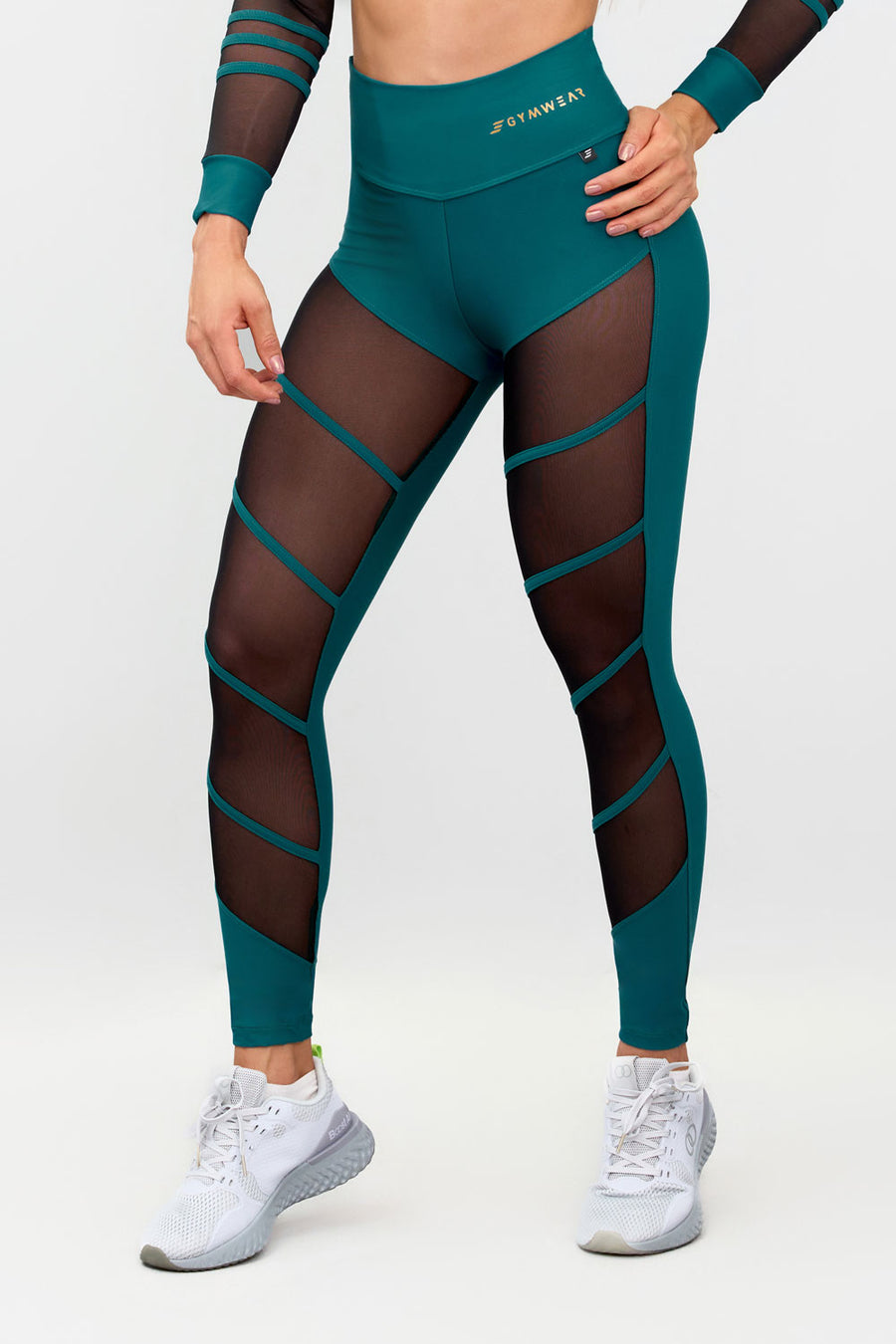 LEGGINGS COLOR VERDE CON DISEÑO EN LA PARTE FRONTAL.