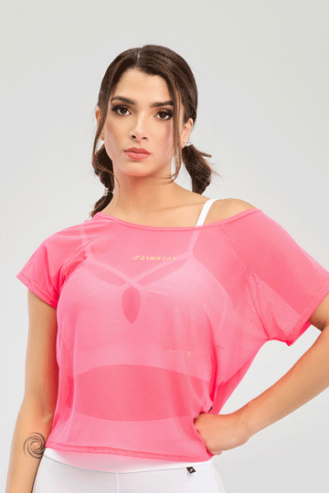 BLUSA MALLA COLOR ROSADO, CON SILUETA AMPLIA, CON PANELES PARA MEJOR CIRCULACIÓN DEL AIRE. 