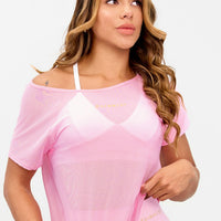 MALLA DEPORTIVA DE MUJER COLOR ROSADO, SILUETA AMPLIA CON TELA TRANSPIRABLE. 