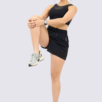 PANTALONETA NEGRA CON MALLAS LATERALES RVC