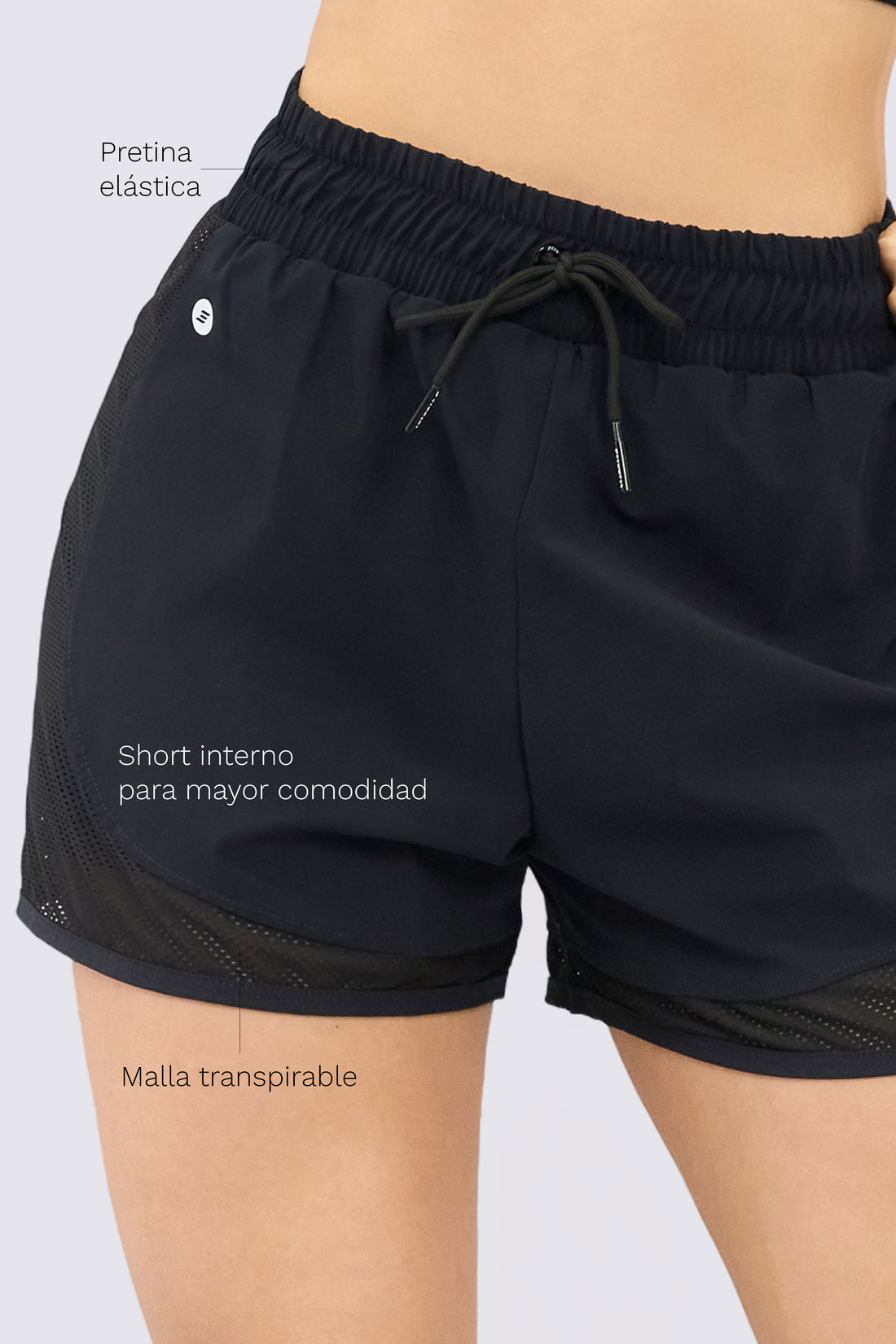 PANTALONETA NEGRA CON MALLAS LATERALES RVC