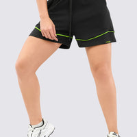 Short deportivo oversize, con cordón ajustable, bolsillos y detalles en venas verdes