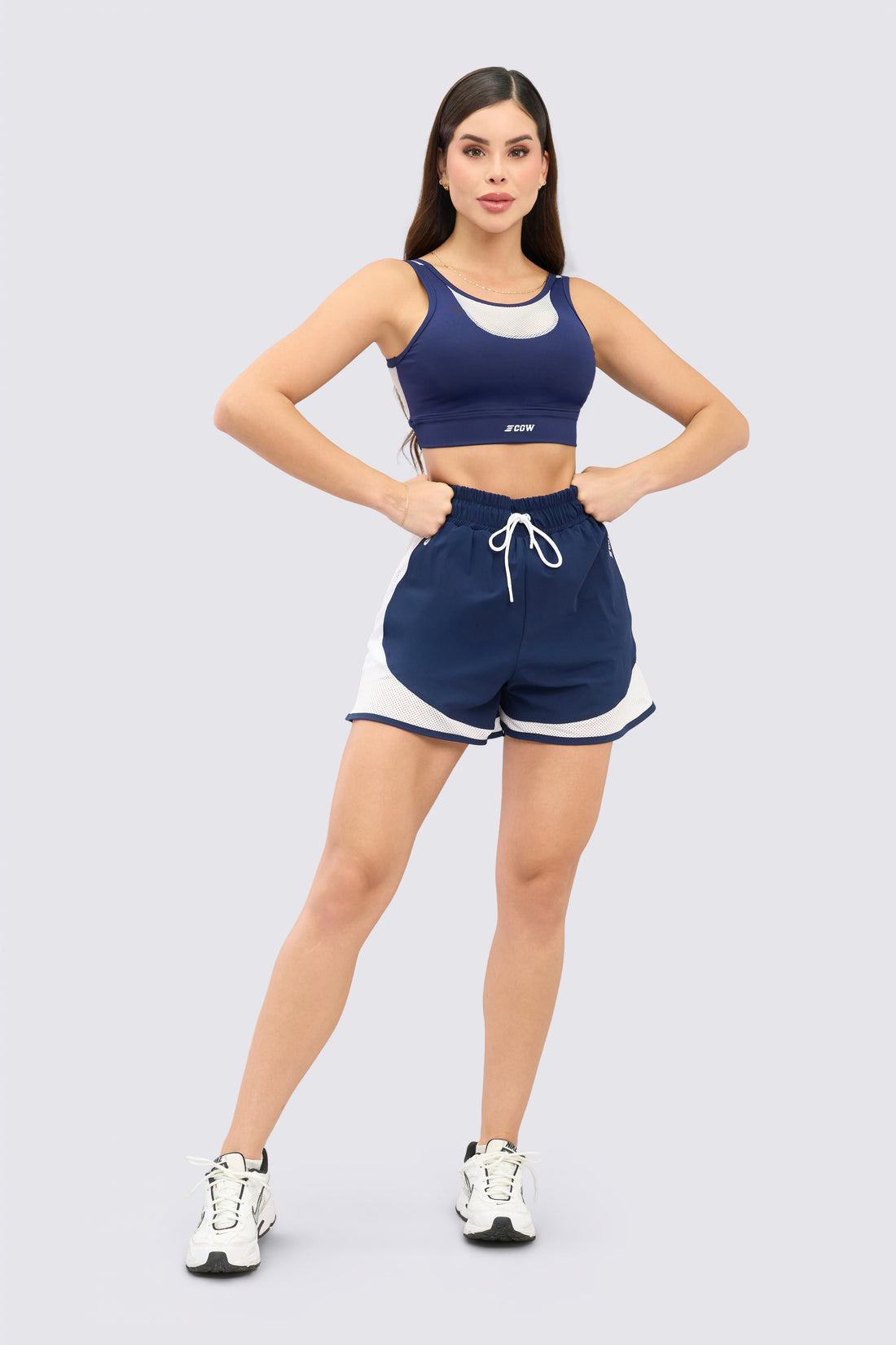 TOP DEPORTIVO AZUL MALLA FRONTAL BLANCA RVC