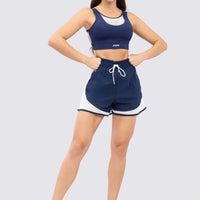TOP DEPORTIVO AZUL MALLA FRONTAL BLANCA RVC