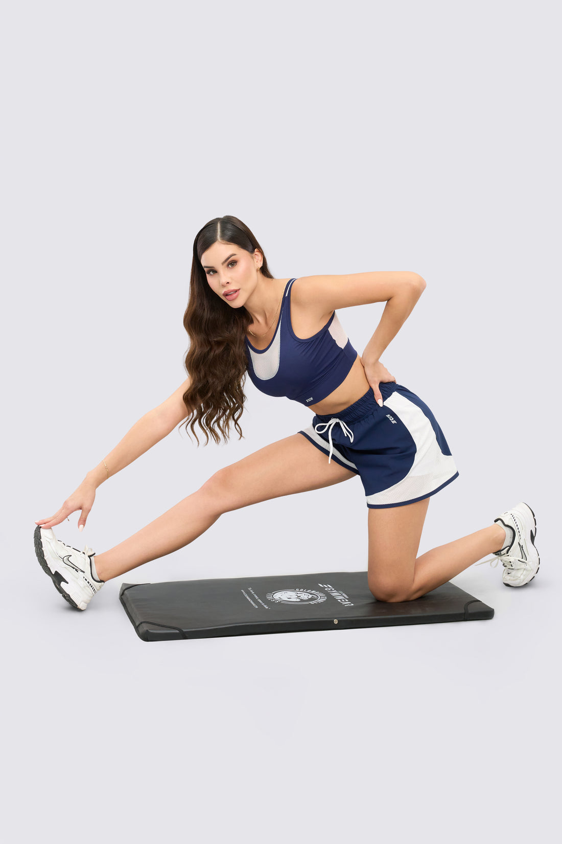 TOP DEPORTIVO AZUL MALLA FRONTAL BLANCA RVC