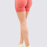 Short seamless color coral, con arrunche en cola.