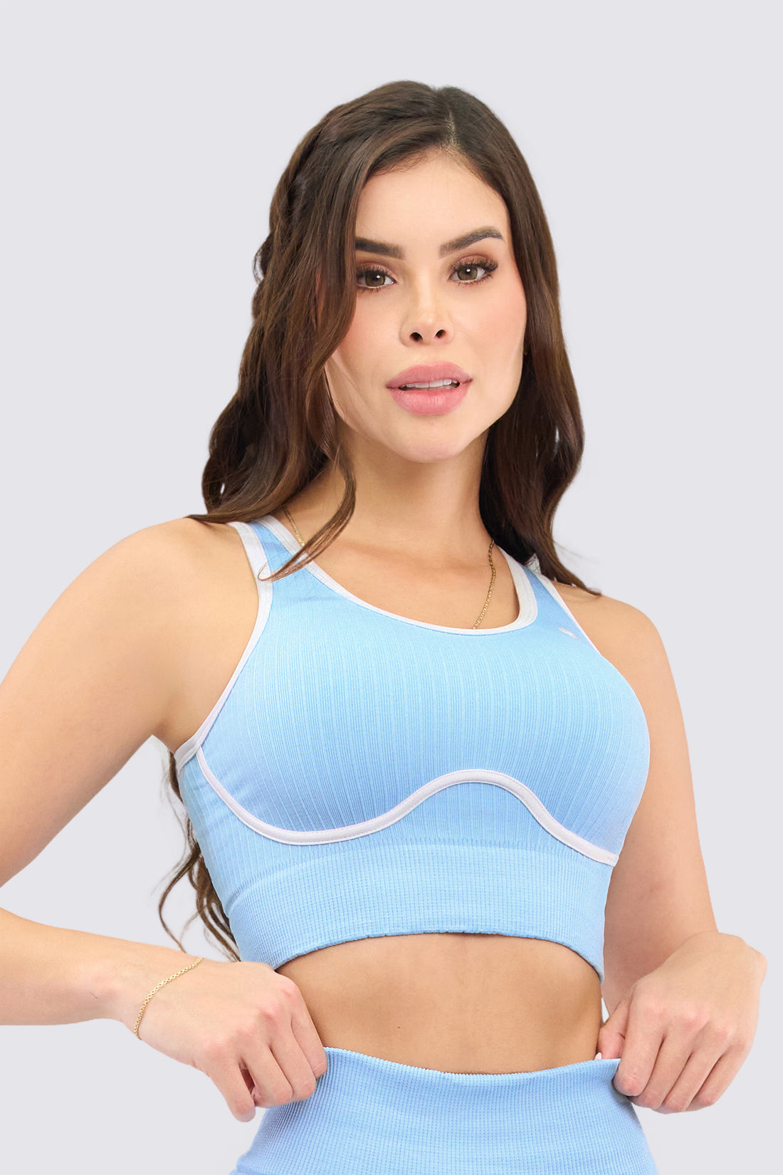 Top deportivo azul con textura acanalada. venas en contraste , ajuste perfecto y cómodo. 