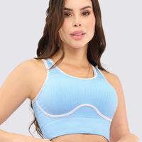 Top deportivo azul con textura acanalada. venas en contraste , ajuste perfecto y cómodo. 