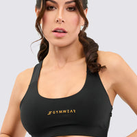 Top deportivo color negro, con alto soporte y perfecto para cualquier actividad deportiva. 