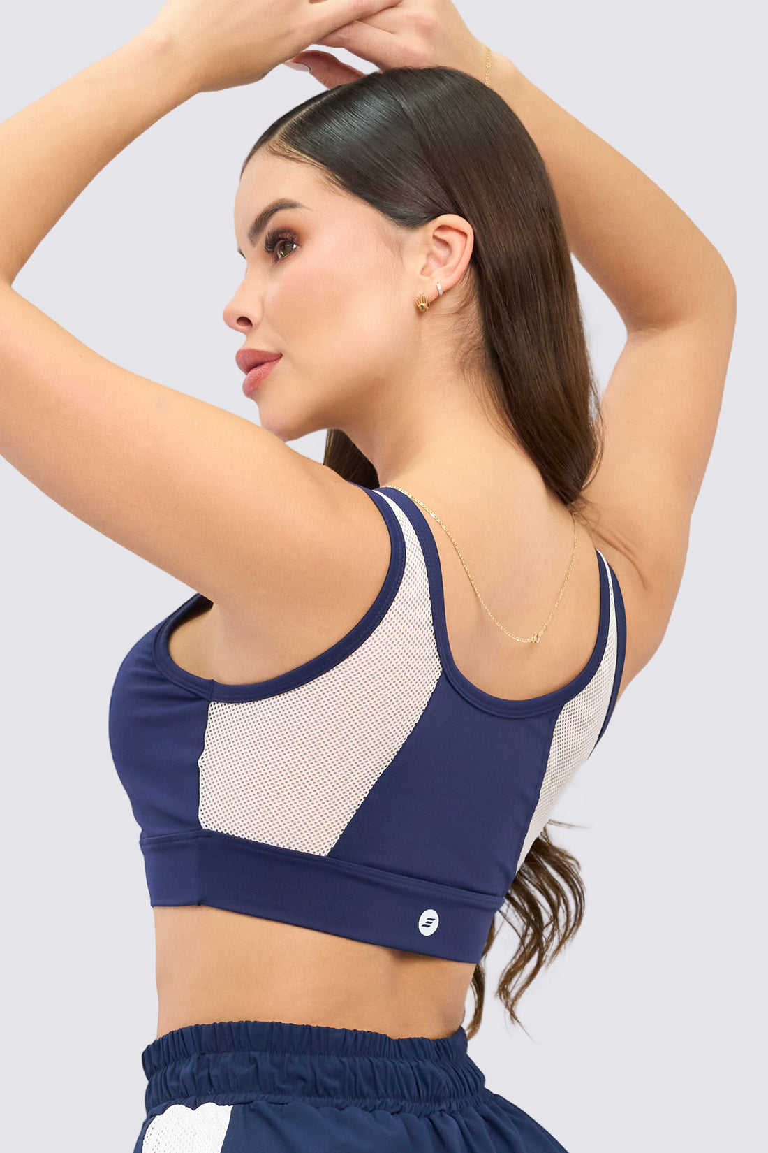 TOP DEPORTIVO AZUL MALLA FRONTAL BLANCA RVC