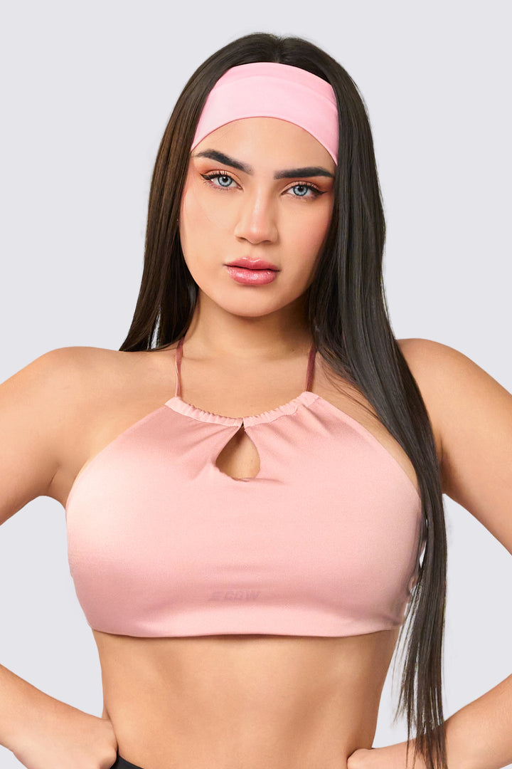 Top deportivo color palo de rosa, con tirantes finos cruzados en la espalda, 