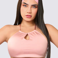 Top deportivo color palo de rosa, con tirantes finos cruzados en la espalda, 