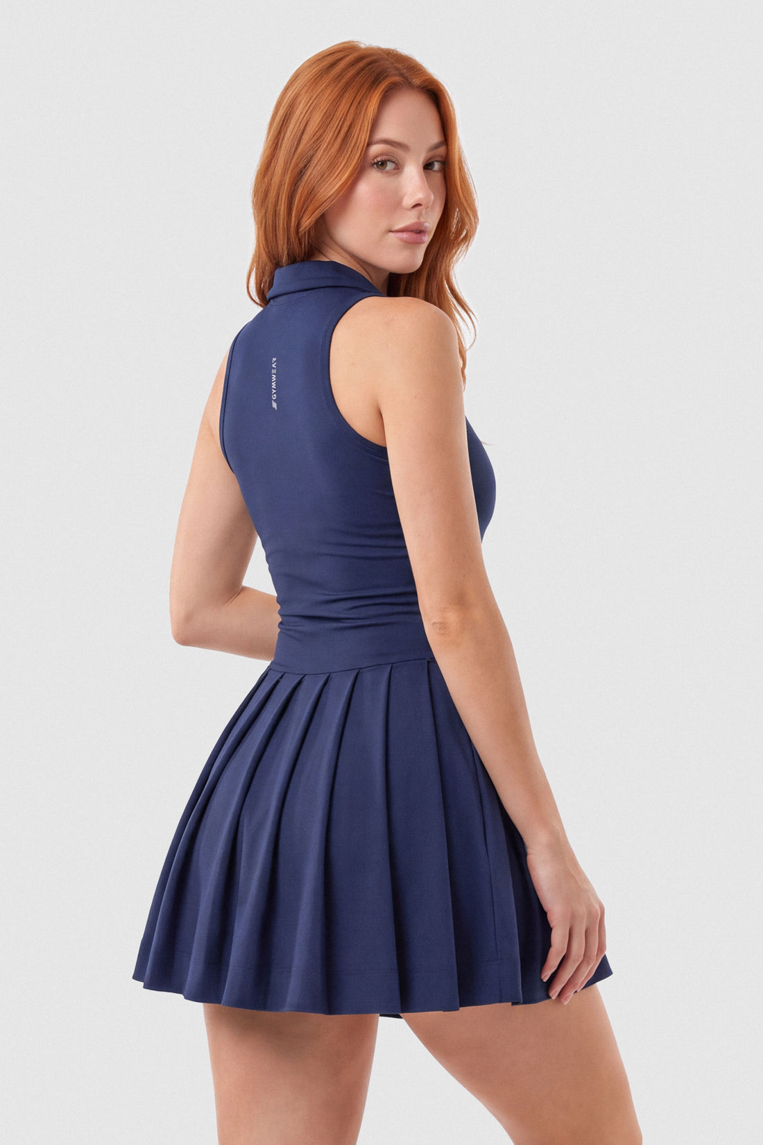 VESTIDO AZUL MARINO CUELLO ESTILO POLO Y FALDA CON PLIEGUES PPC